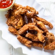 So easy to make and flavorful...this is an elevated fried chicken! Garlic and Thyme Fried Chicken Fingers from thelittlekitchen.net