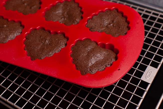 Heart Shaped Chocolate Cake from thelittlekitchen.net heart shaped baking pan on a cooling rack