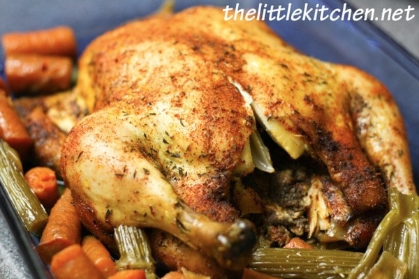 Whole Chicken in a Slow Cooker from The Little Kitchen Slow Cooker Whole Chicken in a blue baking dish